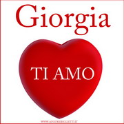 biglietto con cuore rosso e scritta ti amo